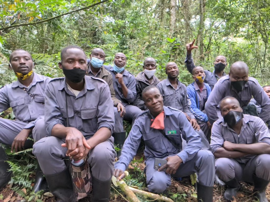 Eleven porters, in their gray uniforms.