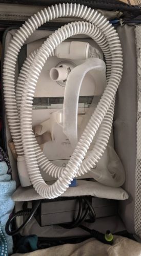 CPAP in case with mask, tubing, and power brick